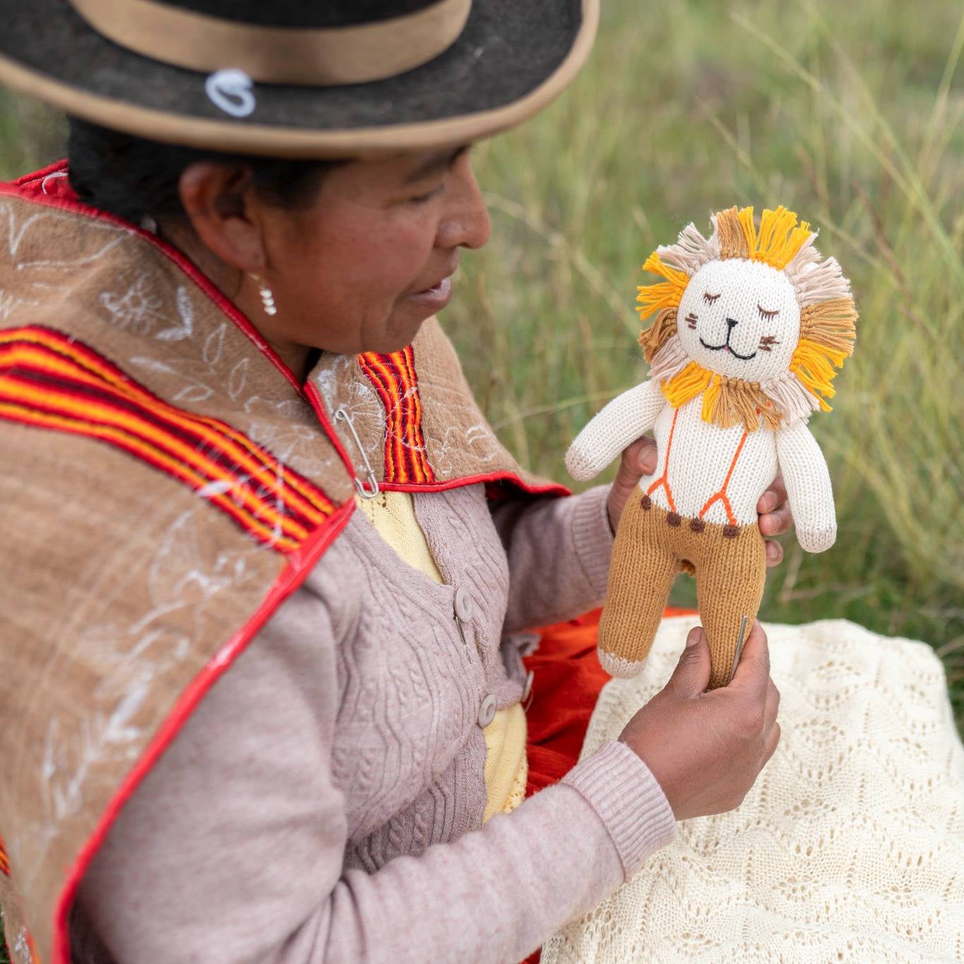 Wari Handmade Lion Doll + Storybook – “Asiri and the Treasure of Lake Titicaca” Collection
