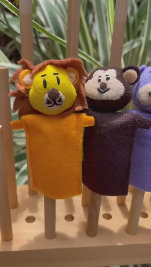 Set of four jungle finger puppets including a lion, monkey, hippo, and koala, handmade in Peru
